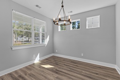 Welcome to 413 Renau Boulevard -- a stunning 4 bedroom, 2.5 bath on The Club at Pine Forest  in South Carolina - for sale on GolfHomes.com, golf home, golf lot