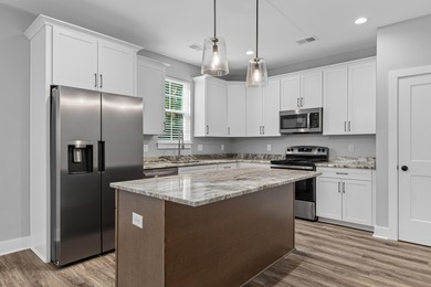 Welcome to 413 Renau Boulevard -- a stunning 4 bedroom, 2.5 bath on The Club at Pine Forest  in South Carolina - for sale on GolfHomes.com, golf home, golf lot