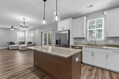 Welcome to 413 Renau Boulevard -- a stunning 4 bedroom, 2.5 bath on The Club at Pine Forest  in South Carolina - for sale on GolfHomes.com, golf home, golf lot