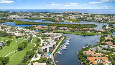 Beautiful waterfront condo in the gated community of Jonathan's on Jonathans Landing Golf Club in Florida - for sale on GolfHomes.com, golf home, golf lot