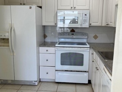 1 bedroom 1 1/2 condo with garden view, brand new microwave and on Kings Point Golf -Flanders Way in Florida - for sale on GolfHomes.com, golf home, golf lot