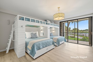 Beautifully updated waterfront condo in the gated community of on Jonathans Landing Golf Club in Florida - for sale on GolfHomes.com, golf home, golf lot