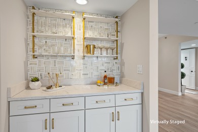Beautifully updated waterfront condo in the gated community of on Jonathans Landing Golf Club in Florida - for sale on GolfHomes.com, golf home, golf lot