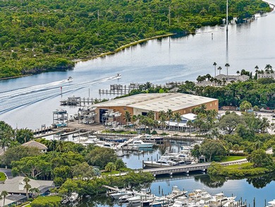 Beautiful waterfront condo in the gated community of Jonathan's on Jonathans Landing Golf Club in Florida - for sale on GolfHomes.com, golf home, golf lot