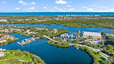 Beautiful waterfront condo in the gated community of Jonathan's on Jonathans Landing Golf Club in Florida - for sale on GolfHomes.com, golf home, golf lot