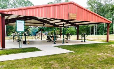 Lake life awaits in the gated community of Lake Royale! This on River Golf and Country Club at Lake Royale in North Carolina - for sale on GolfHomes.com, golf home, golf lot