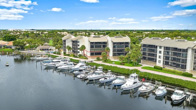 Beautifully updated waterfront condo in the gated community of on Jonathans Landing Golf Club in Florida - for sale on GolfHomes.com, golf home, golf lot