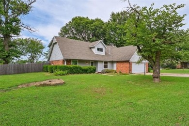 This spacious home sits on a fully fenced 0.61-acre lot and on Forest Ridge Golf Club in Oklahoma - for sale on GolfHomes.com, golf home, golf lot