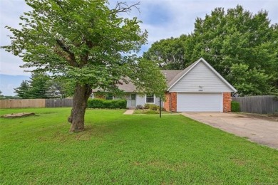 This spacious home sits on a fully fenced 0.61-acre lot and on Forest Ridge Golf Club in Oklahoma - for sale on GolfHomes.com, golf home, golf lot