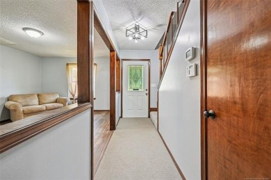 This spacious home sits on a fully fenced 0.61-acre lot and on Forest Ridge Golf Club in Oklahoma - for sale on GolfHomes.com, golf home, golf lot