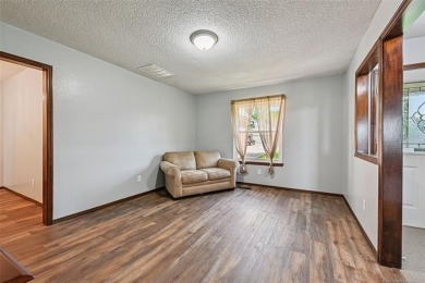 This spacious home sits on a fully fenced 0.61-acre lot and on Forest Ridge Golf Club in Oklahoma - for sale on GolfHomes.com, golf home, golf lot