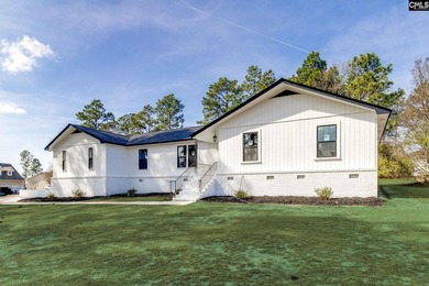 Welcome home to a single-level living space, a custom-built on The Woodlands Country Club in South Carolina - for sale on GolfHomes.com, golf home, golf lot