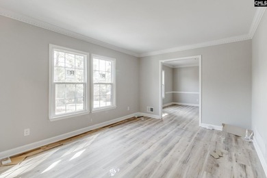 Welcome home to a single-level living space, a custom-built on The Woodlands Country Club in South Carolina - for sale on GolfHomes.com, golf home, golf lot