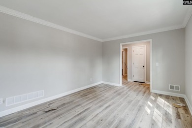 Welcome home to a single-level living space, a custom-built on The Woodlands Country Club in South Carolina - for sale on GolfHomes.com, golf home, golf lot