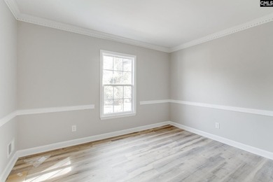 Welcome home to a single-level living space, a custom-built on The Woodlands Country Club in South Carolina - for sale on GolfHomes.com, golf home, golf lot