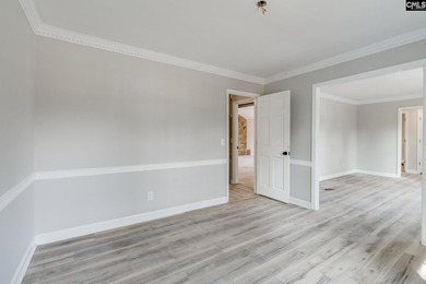 Welcome home to a single-level living space, a custom-built on The Woodlands Country Club in South Carolina - for sale on GolfHomes.com, golf home, golf lot