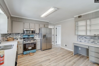 Welcome home to a single-level living space, a custom-built on The Woodlands Country Club in South Carolina - for sale on GolfHomes.com, golf home, golf lot