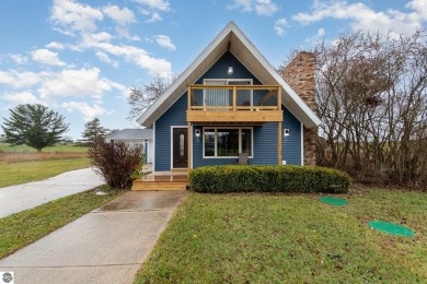 BETTER THAN NEW! Take a look at this sharp 3-bedroom Chalet at on The Pines Golf Course at Lake Isabella in Michigan - for sale on GolfHomes.com, golf home, golf lot