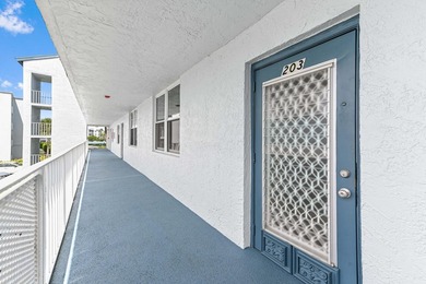 Discover this bright and beautifully maintained 2-bedroom on Oriole Golf and Tennis Club in Florida - for sale on GolfHomes.com, golf home, golf lot