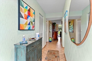 Discover this bright and beautifully maintained 2-bedroom on Oriole Golf and Tennis Club in Florida - for sale on GolfHomes.com, golf home, golf lot