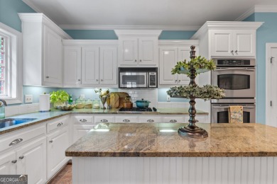 Welcome to this custom-built 4-bedroom, 3 1/2 bath all-brick on Canongate At Georgia National Golf Club in Georgia - for sale on GolfHomes.com, golf home, golf lot