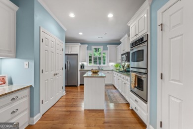 Welcome to this custom-built 4-bedroom, 3 1/2 bath all-brick on Canongate At Georgia National Golf Club in Georgia - for sale on GolfHomes.com, golf home, golf lot