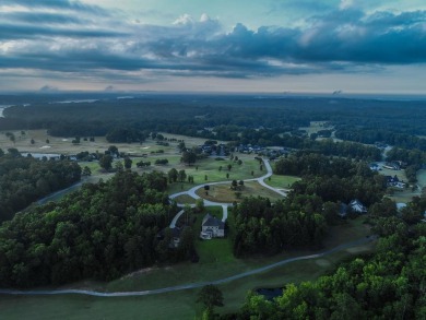 Welcome to 704 Swing About, a like-new custom home built in 2022 on The Links At Stoney Point in South Carolina - for sale on GolfHomes.com, golf home, golf lot