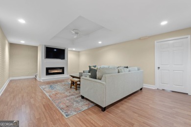Welcome to this custom-built 4-bedroom, 3 1/2 bath all-brick on Canongate At Georgia National Golf Club in Georgia - for sale on GolfHomes.com, golf home, golf lot