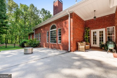 Welcome to this custom-built 4-bedroom, 3 1/2 bath all-brick on Canongate At Georgia National Golf Club in Georgia - for sale on GolfHomes.com, golf home, golf lot