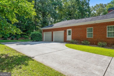 Welcome to this custom-built 4-bedroom, 3 1/2 bath all-brick on Canongate At Georgia National Golf Club in Georgia - for sale on GolfHomes.com, golf home, golf lot