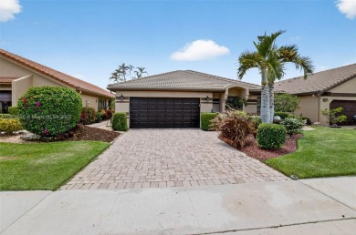 Tucked into an all-age country club in scenic west Boca Raton on  in Florida - for sale on GolfHomes.com, golf home, golf lot