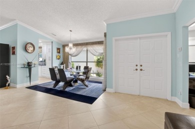 Tucked into an all-age country club in scenic west Boca Raton on  in Florida - for sale on GolfHomes.com, golf home, golf lot
