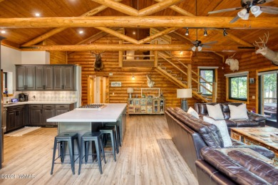 Beautifully renovated real log cabin on the fairway at Pinetop on Pinetop Lakes Country Club in Arizona - for sale on GolfHomes.com, golf home, golf lot