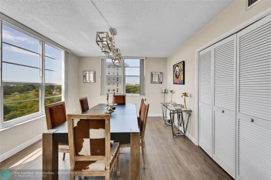 This fully remodeled unit features an open kitchen with white on Palm-Aire Country Club and Resort - Palms in Florida - for sale on GolfHomes.com, golf home, golf lot