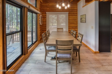 Beautifully renovated real log cabin on the fairway at Pinetop on Pinetop Lakes Country Club in Arizona - for sale on GolfHomes.com, golf home, golf lot