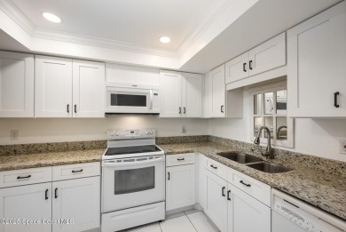 PRIVATE GARAGE...Harbor Green Community Condo with additional on Mallards Landing Golf Course in Florida - for sale on GolfHomes.com, golf home, golf lot