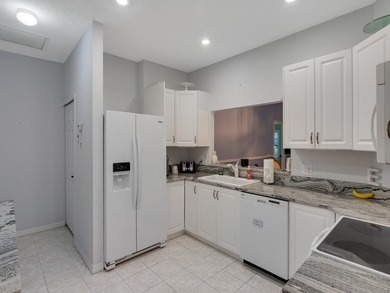 Located on the 5th tee at Gator Trace CC, this beautiful villa on Gator Trace Golf and Country Club in Florida - for sale on GolfHomes.com, golf home, golf lot