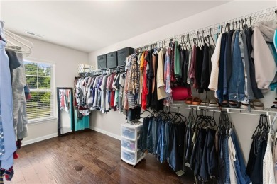 ***Price Improvement!***  Step into warmth and style with this on Chateau Elan Golf Club  in Georgia - for sale on GolfHomes.com, golf home, golf lot
