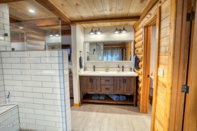 Beautifully renovated real log cabin on the fairway at Pinetop on Pinetop Lakes Country Club in Arizona - for sale on GolfHomes.com, golf home, golf lot