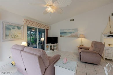 Stunning Rivera model home with fabulous lake and golf course on Herons Glen Golf and Country Club in Florida - for sale on GolfHomes.com, golf home, golf lot