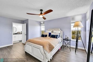This fully remodeled unit features an open kitchen with white on Palm-Aire Country Club and Resort - Palms in Florida - for sale on GolfHomes.com, golf home, golf lot