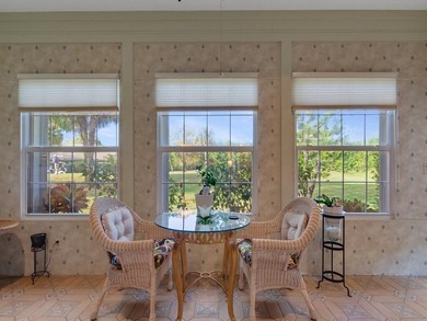 Located on the 5th tee at Gator Trace CC, this beautiful villa on Gator Trace Golf and Country Club in Florida - for sale on GolfHomes.com, golf home, golf lot