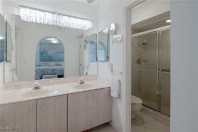 Stunning Rivera model home with fabulous lake and golf course on Herons Glen Golf and Country Club in Florida - for sale on GolfHomes.com, golf home, golf lot