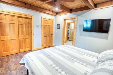 Beautifully renovated real log cabin on the fairway at Pinetop on Pinetop Lakes Country Club in Arizona - for sale on GolfHomes.com, golf home, golf lot