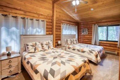 Beautifully renovated real log cabin on the fairway at Pinetop on Pinetop Lakes Country Club in Arizona - for sale on GolfHomes.com, golf home, golf lot