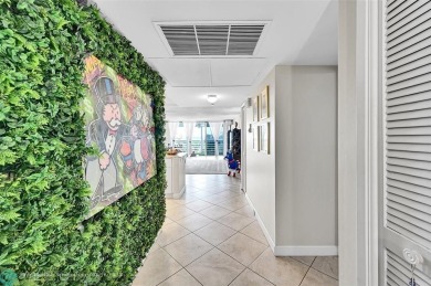 This fully remodeled unit features an open kitchen with white on Palm-Aire Country Club and Resort - Palms in Florida - for sale on GolfHomes.com, golf home, golf lot