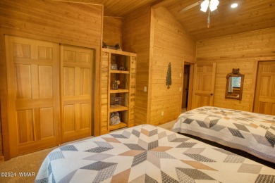 Beautifully renovated real log cabin on the fairway at Pinetop on Pinetop Lakes Country Club in Arizona - for sale on GolfHomes.com, golf home, golf lot