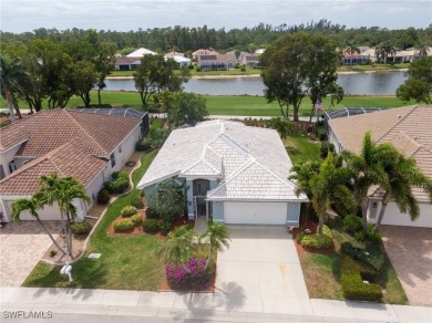 Stunning Rivera model home with fabulous lake and golf course on Herons Glen Golf and Country Club in Florida - for sale on GolfHomes.com, golf home, golf lot