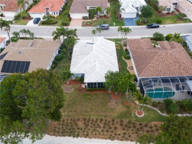 Stunning Rivera model home with fabulous lake and golf course on Herons Glen Golf and Country Club in Florida - for sale on GolfHomes.com, golf home, golf lot