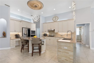 Honey Stop the car this is a must see Home! This delightful 4 on The Grand Club Cypress Course in Florida - for sale on GolfHomes.com, golf home, golf lot